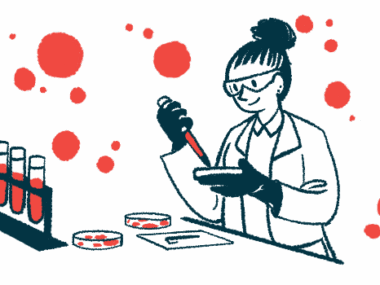 A researcher works with a dropper and petri dishes in a laboratory, with a rack of filled test tubes on the counter nearby.