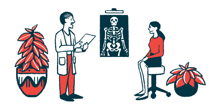 An X-ray hangs on wall as a doctor speaks with a patient.