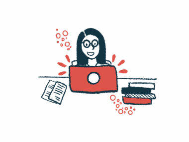 A woman works on a laptop.